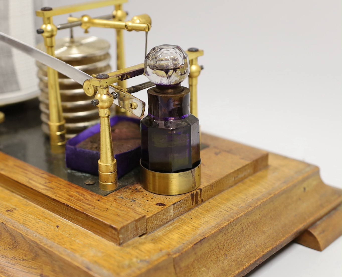 An oak cased barograph